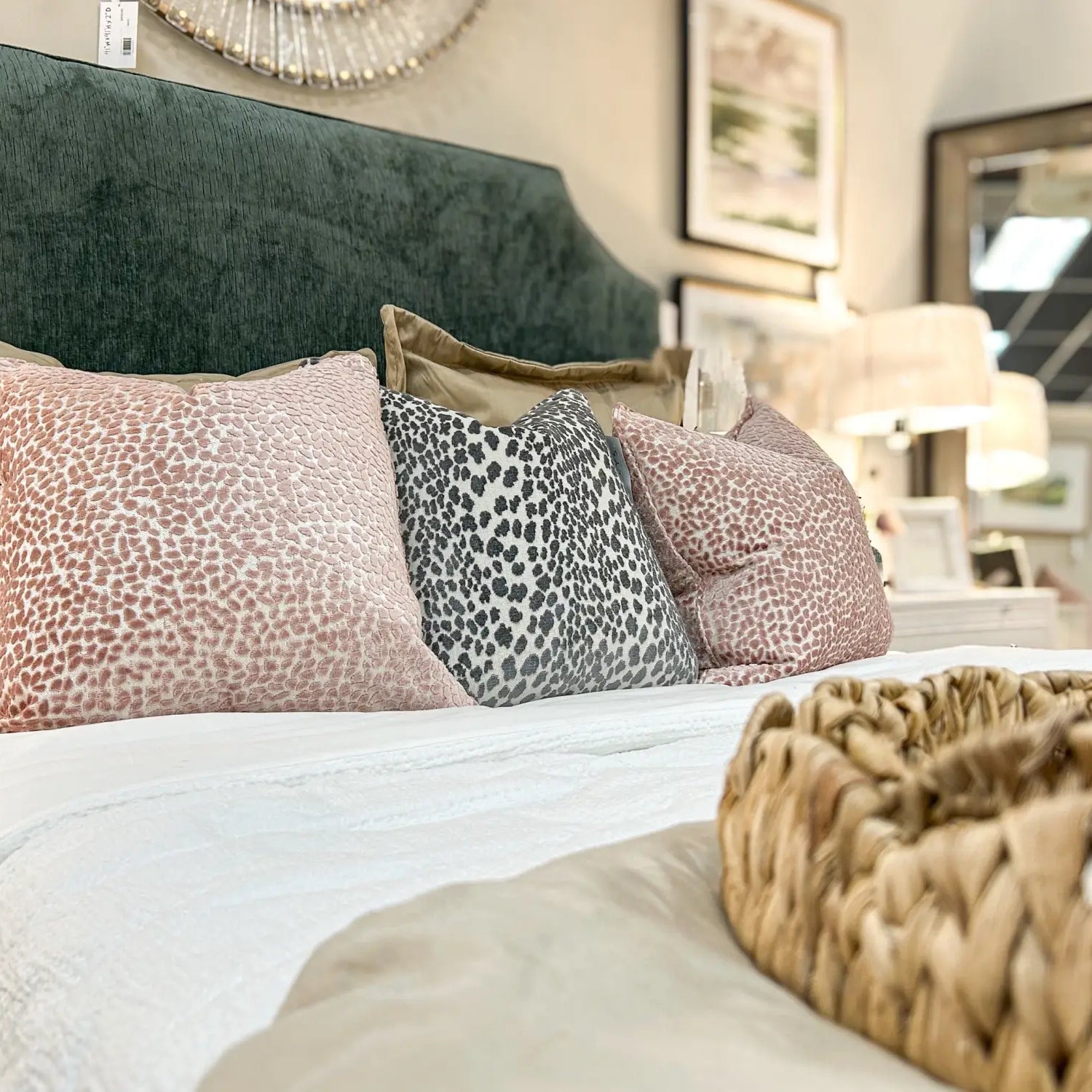 Pink, blue, and greens tied into a cozy bedroom design.