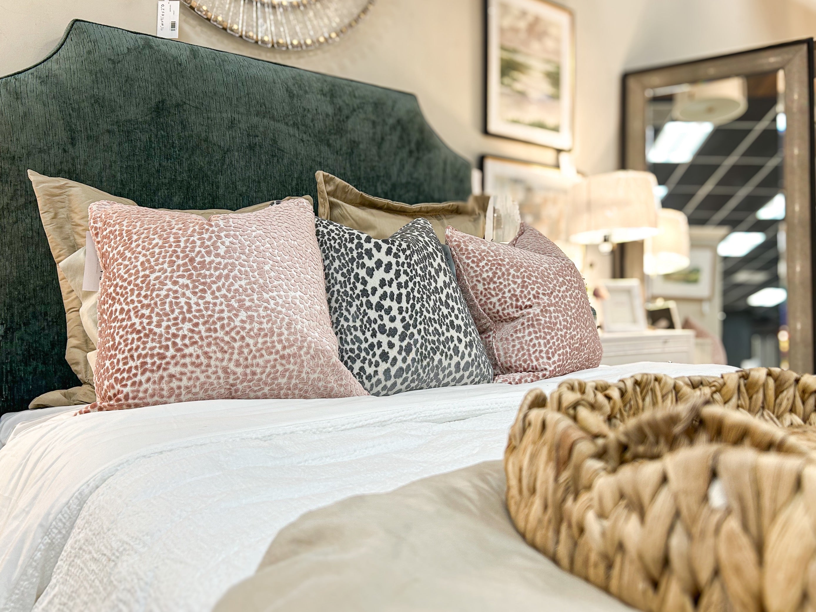 Pink, blue, and greens tied into a cozy bedroom design.