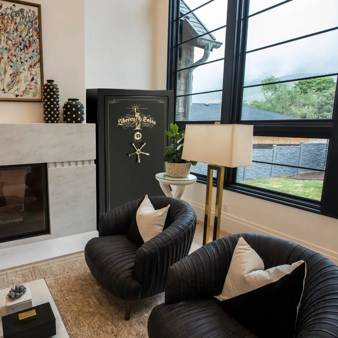 Black liberty safe safe with gold lettering and crossed keys on the front