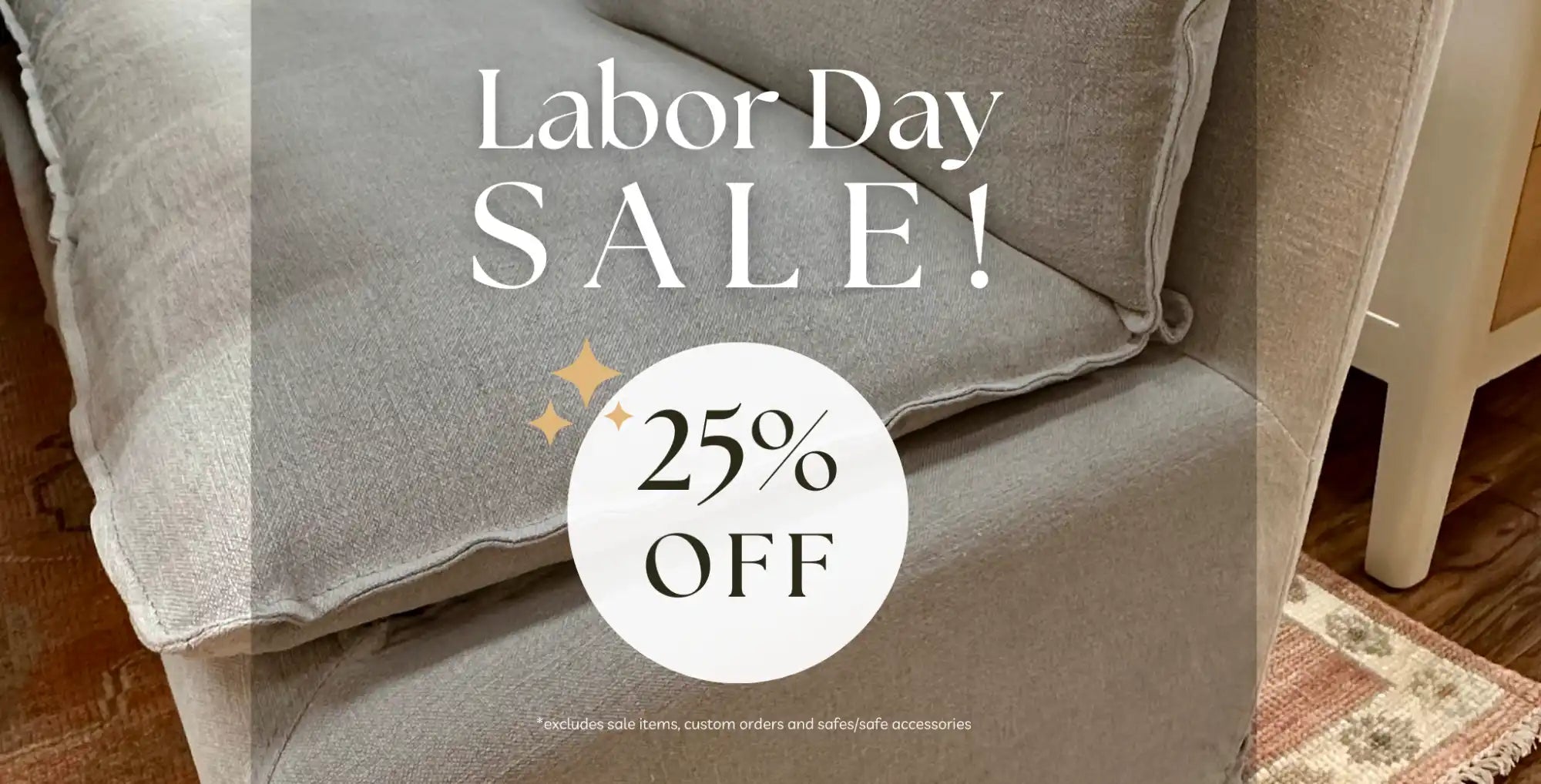 A light gray upholstered sofa or armchair.